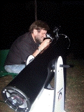 Denis
                      with telescope